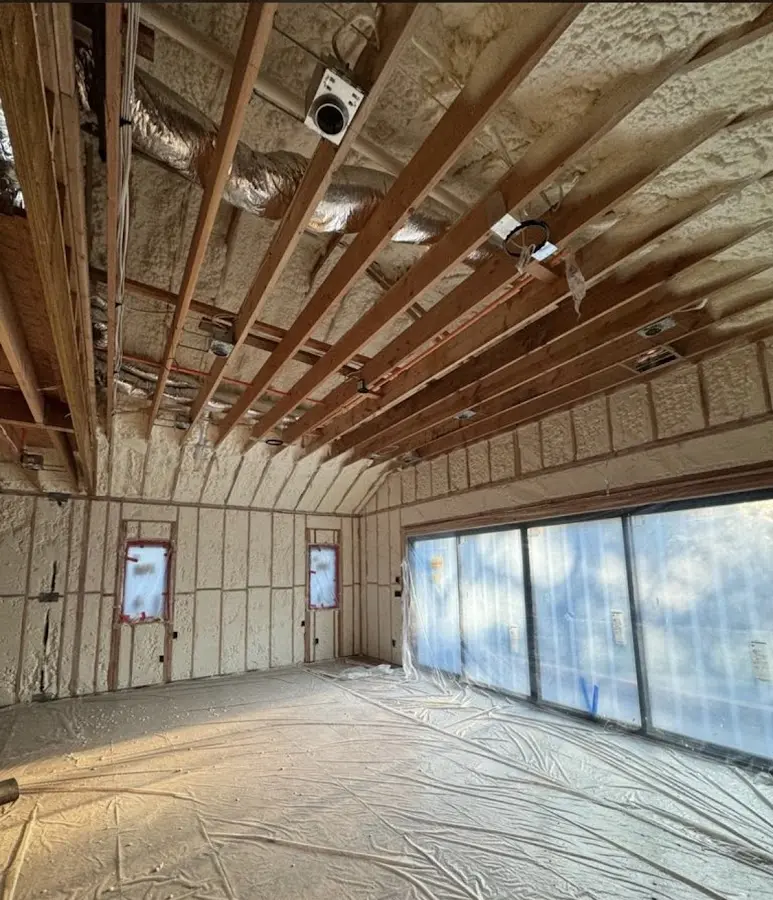 Interior walls and ceiling insulated with spray foam during new construction in Cartersville